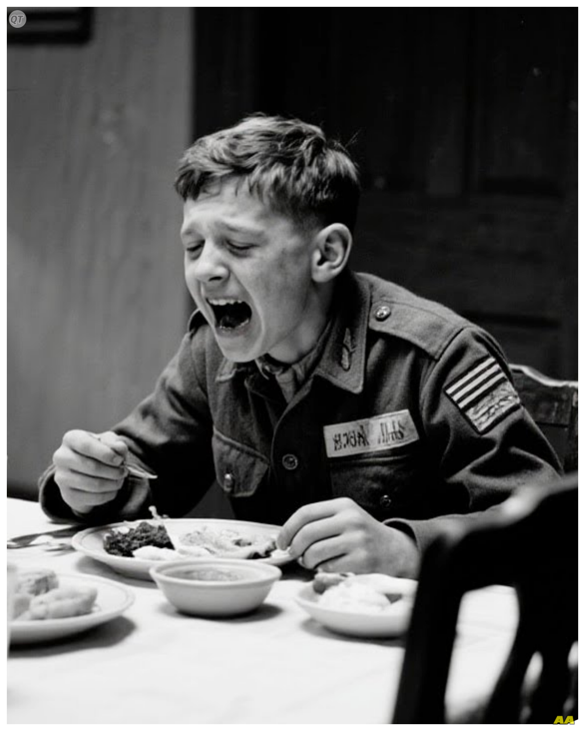 When a Starving German Teen POW Sat Down at an American Mess Hall — The Meal Changed His Life  Camp Concordia, Kansas.  November 1943.  The Messaul stretched long and low beneath a sky so vast it made the earth feel small, its windows glowing yellow against the gathering dusk.  Inside, steam rose from industrial kettles, carrying the scent of beef stew and fresh bread across wooden tables where American guards ate shoulderto-shoulder with their charges.  18-year-old Klo Snder stood at the entrance.  hollow- cheicked and trembling, staring at more food than he had seen in two years.  He had been taught that Americans were wasteful, careless, weak.  What happened in the next hour would shatter that belief and every assumption he had carried across the Atlantic, not through words or propaganda, but through the simple, devastating power of a meal served without hatred.  Klouse had surrendered in Tunisia, emerging from a collapsed bunker with his hands raised and his body already beginning the slow process of starvation that the regime had started and the desert had finished.  He was 18 years old, but looked younger, sharp cheekbones pressing against skin that had forgotten what fullness felt like, eyes too large in a face, carved down to its essential structure by months of inadequate rations.  The British had processed him first at a temporary camp near Tunis, where dust settled over everything like a second skin, and men waited in long lines for water that tasted of chemicals in hope…………
