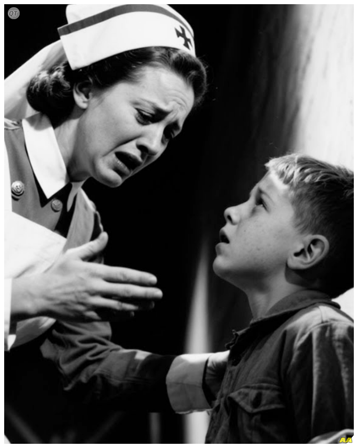 An American Nurse Asked a German POW Child One Question — The Answer Stopped Her Cold Camp McCain, Mississippi. July 1945. The infirmary smelled of antiseptic and pine cleaner. Afternoon heat pressing through screened windows despite the ceiling fans slow rotation. Lieutenant Ruth Carson, Army nurse course, knelt beside a bed where 8-year-old Dier Schmidt sat, waiting for his physical examination. His small frame rigid with the careful stillness of children who have learned to take up minimal space. She smiled, trying to ease his obvious fear, and asked in simple English the question she asked every child patient. “Do you have a favorite food? Something you really love to eat?” His answer, delivered in halting English, made her hands stop moving. She would spend 60 years trying to understand it. Camp McCain had been converted in May 1945 to house a unique population German families, primarily women and children who had been living in occupied Europe when Allied forces advanced. They were classified under complex legal frameworks. Some as prisoners of war, some as displaced persons, some as detainees awaiting classification. All existing in bureaucratic limbo while authorities determined what to do with German civilians caught on the wrong side of history. Dier had arrived with his mother Greta Schmidt in June………..